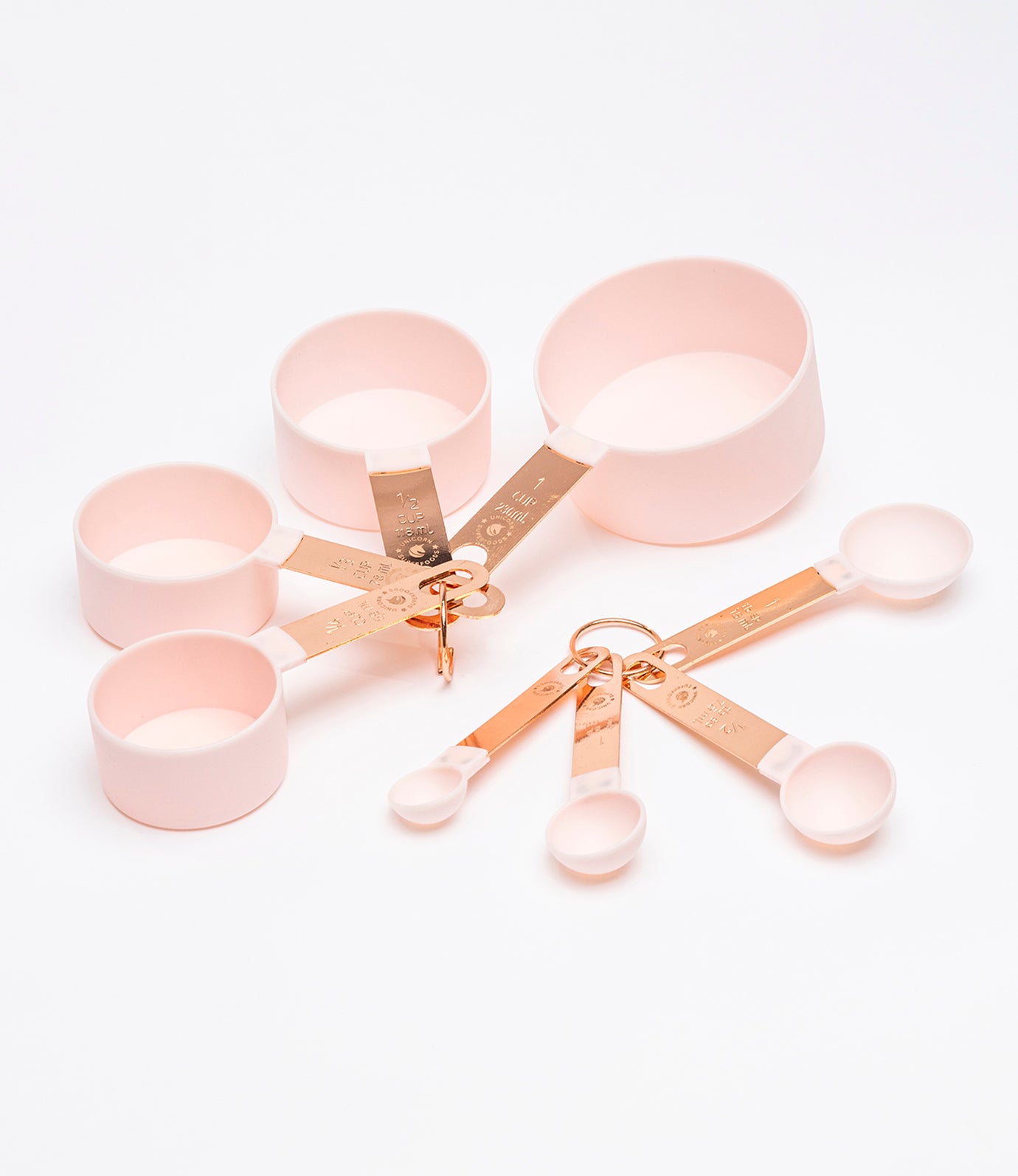 8 piece measuring cup and spoon set with rose gold handles